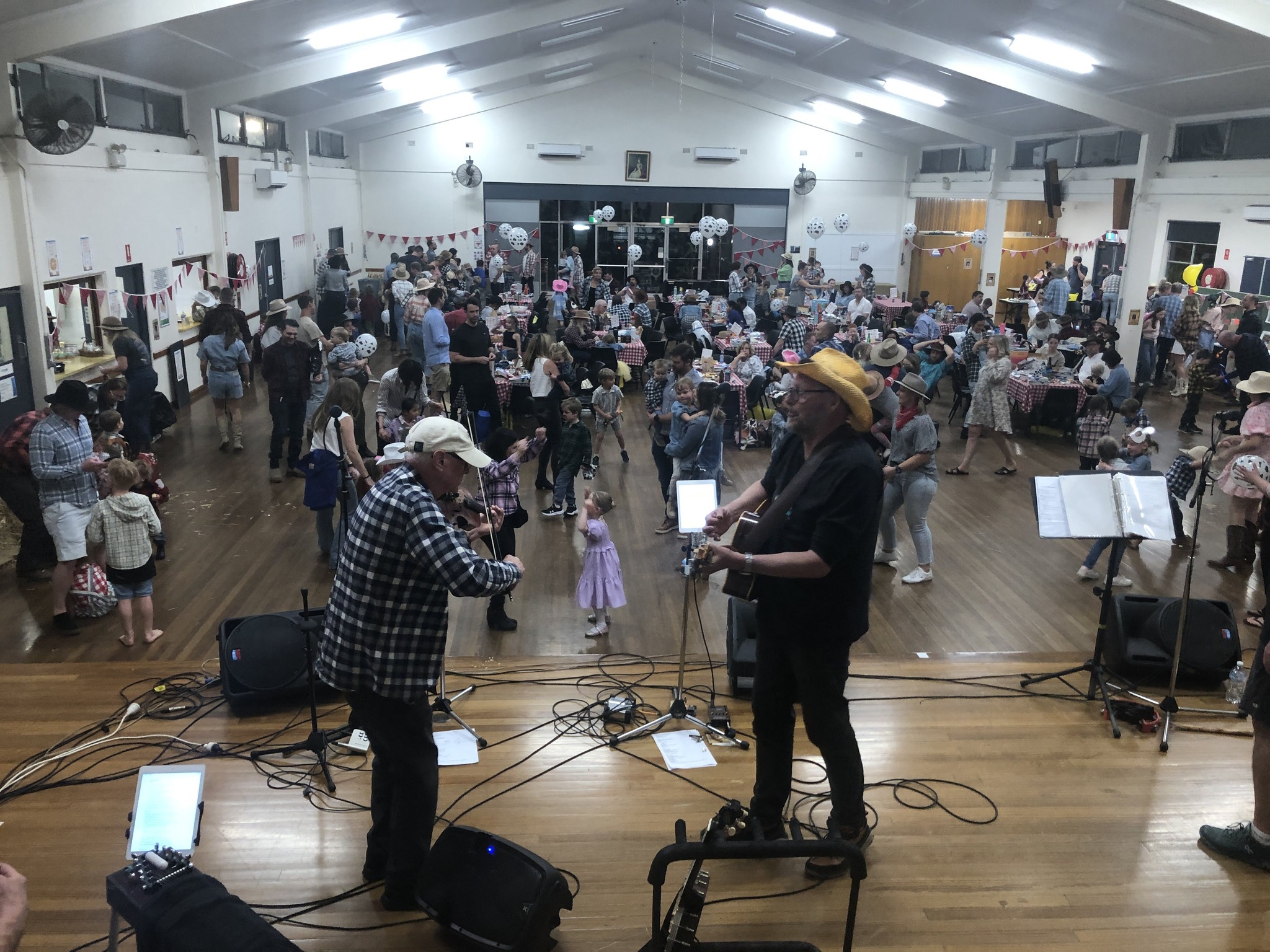 The Ducks performing at a community event